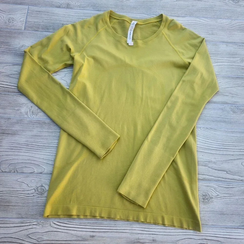 (8) Lululemon Swiftly Tech Long Sleeve Top